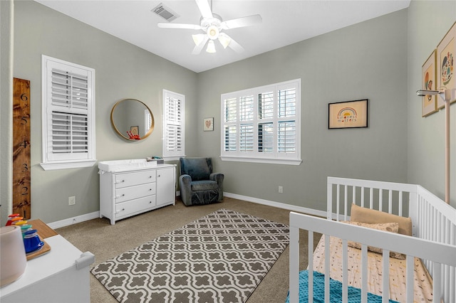 2043 W 14th 1/2 St, Houston, TX 77008 - carpeted bedroom with a nursery area and ceiling fan
