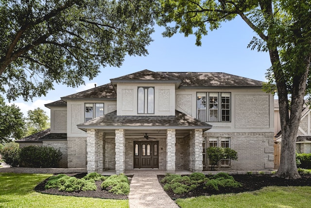 3503 Arbor Terrace Ct, Spring, TX 77388 - view of front of property featuring stucco siding, covered porch, and roof with shingles