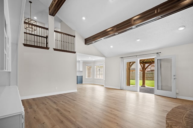 3503 Arbor Terrace Ct, Spring, TX 77388 - unfurnished living room featuring beamed ceiling, light wood-style floors, recessed lighting, and high vaulted ceiling
