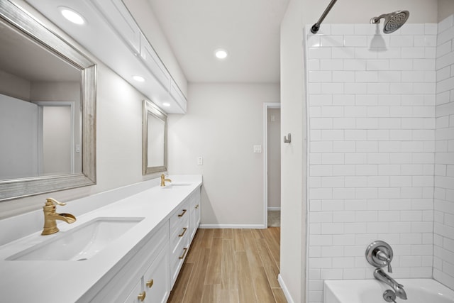 3503 Arbor Terrace Ct, Spring, TX 77388 - bathroom featuring double vanity, tub / shower combination, recessed lighting, and wood finished floors