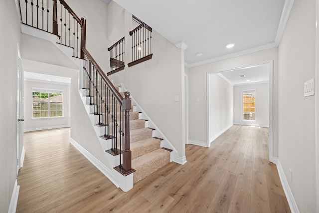3503 Arbor Terrace Ct, Spring, TX 77388 - staircase with wood finished floors, ornamental molding, and recessed lighting