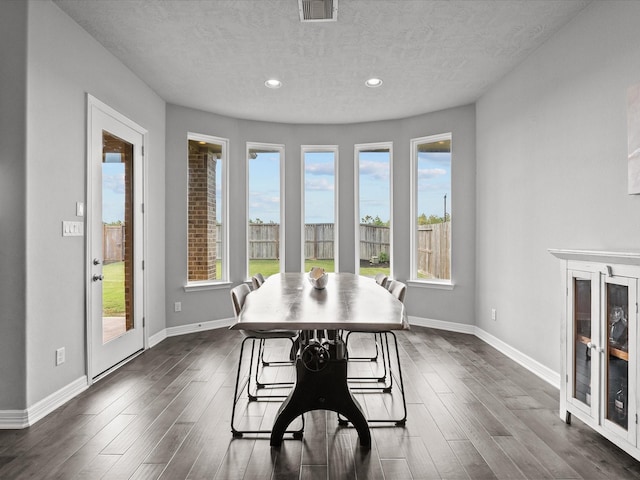 3723 Kerr Commons Ln, Houston, TX 77059 - dining space with a textured ceiling, recessed lighting, and dark wood-style flooring