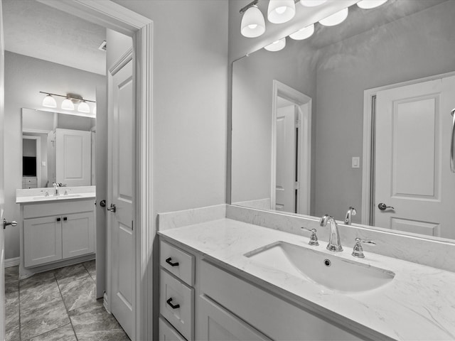 3723 Kerr Commons Ln, Houston, TX 77059 - bathroom with vanity and marble look tile flooring