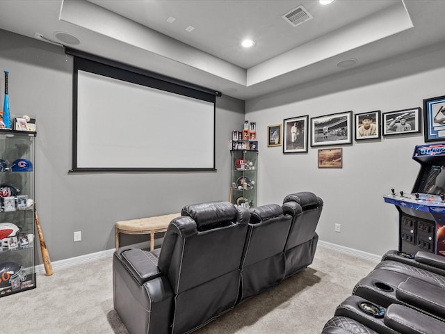 3723 Kerr Commons Ln, Houston, TX 77059 - home theater room with light carpet, a tray ceiling, and recessed lighting