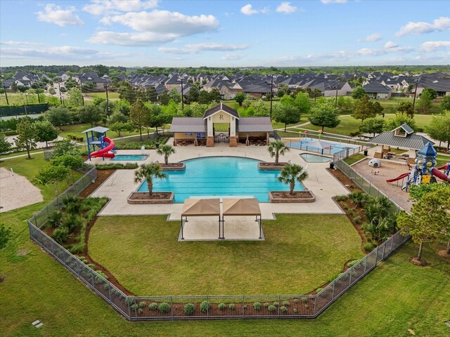 3723 Kerr Commons Ln, Houston, TX 77059 - community pool with a community hot tub, a fenced backyard, a residential view, and a patio