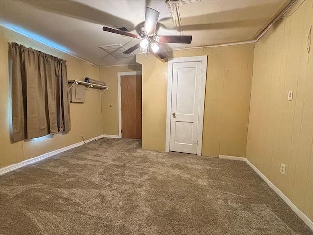 1410 W Pavillion St, Woodville, TX 75979 - unfurnished bedroom featuring carpet and a ceiling fan