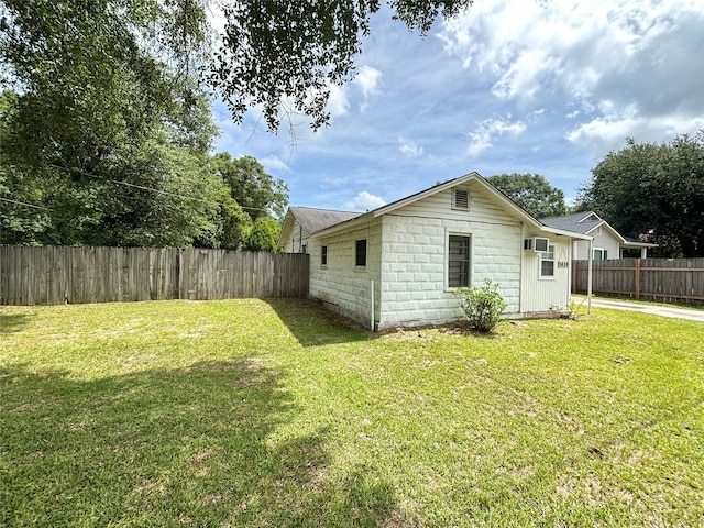 1410 W Pavillion St, Woodville, TX 75979 - rear view of property featuring a fenced backyard