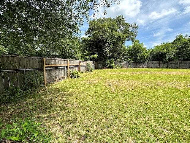 1410 W Pavillion St, Woodville, TX 75979 - view of fenced backyard