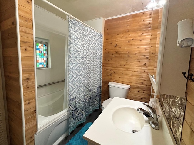 1410 W Pavillion St, Woodville, TX 75979 - bathroom featuring wooden walls, shower / bath combination with curtain, and vanity