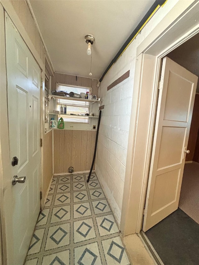 1410 W Pavillion St, Woodville, TX 75979 - corridor with concrete block wall