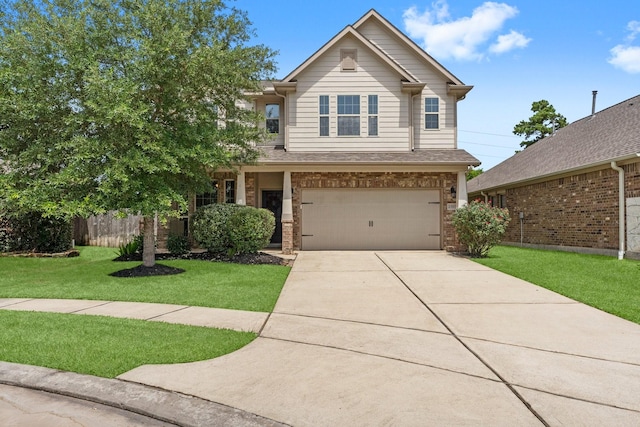 23707 Pennington Hills Dr, Spring, TX 77389 - view of front of property featuring brick siding, an attached garage, and concrete driveway