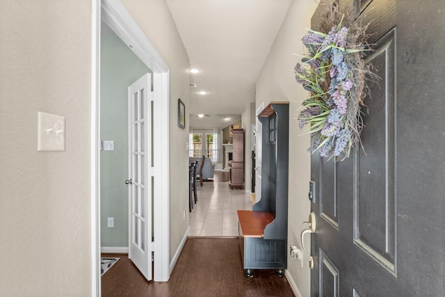 23707 Pennington Hills Dr, Spring, TX 77389 - entrance foyer with dark wood-type flooring and baseboards