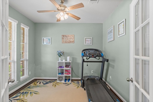 23707 Pennington Hills Dr, Spring, TX 77389 - workout area featuring healthy amount of natural light, ceiling fan, french doors, and carpet floors