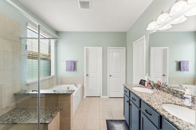 23707 Pennington Hills Dr, Spring, TX 77389 - bathroom featuring a garden tub, double vanity, tile patterned floors, and a shower stall