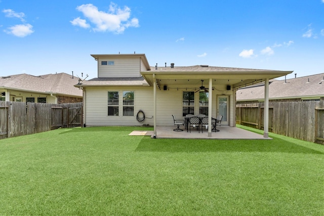 23707 Pennington Hills Dr, Spring, TX 77389 - back of house with ceiling fan, a fenced backyard, and a patio