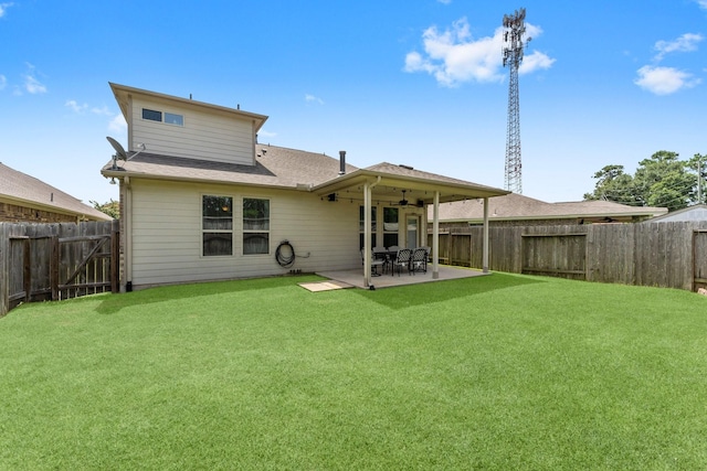 23707 Pennington Hills Dr, Spring, TX 77389 - back of house featuring a fenced backyard, ceiling fan, a patio, and a shingled roof