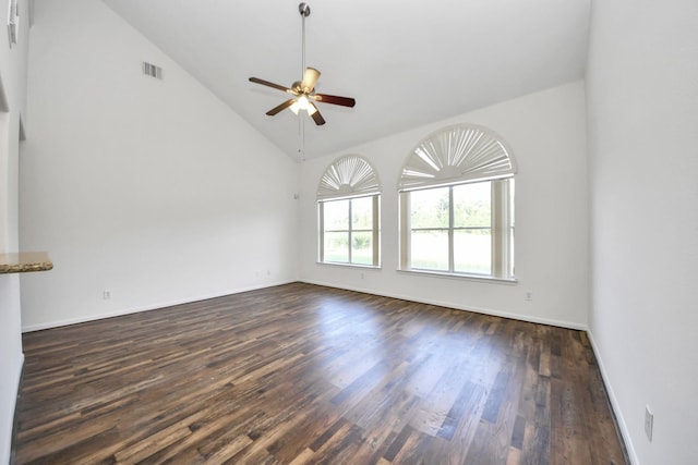 32310 Archer Park, Conroe, TX 77385 - spare room featuring dark wood-type flooring, ceiling fan, and high vaulted ceiling