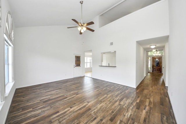 32310 Archer Park, Conroe, TX 77385 - unfurnished living room with dark wood finished floors, a ceiling fan, and high vaulted ceiling
