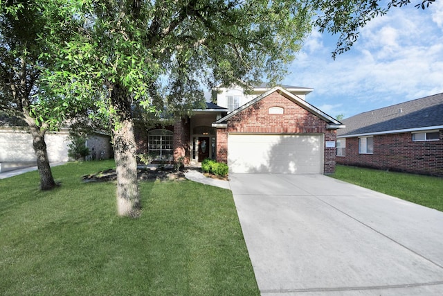 32310 Archer Park, Conroe, TX 77385 - traditional-style house with brick siding, an attached garage, driveway, and a front yard