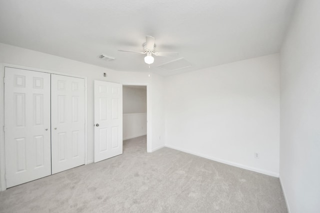 32310 Archer Park, Conroe, TX 77385 - unfurnished bedroom featuring carpet, a closet, and ceiling fan