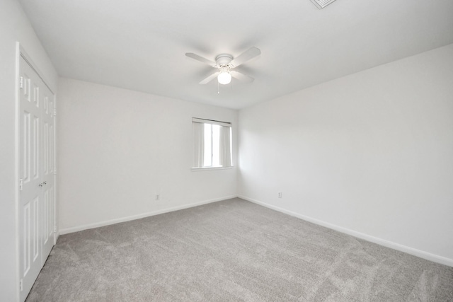 32310 Archer Park, Conroe, TX 77385 - unfurnished bedroom featuring carpet floors, a closet, and ceiling fan