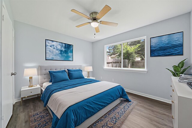 23206 Goodfellow Dr, Spring, TX 77373 - bedroom featuring wood finished floors and a ceiling fan
