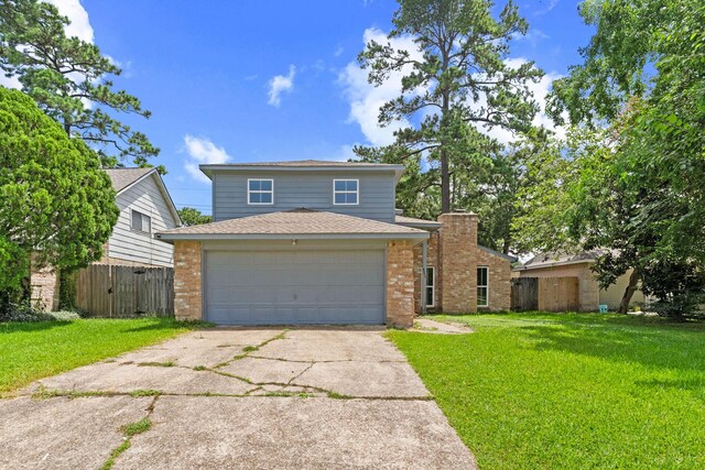 23206 Goodfellow Dr, Spring, TX 77373 - view of front of property featuring driveway, brick siding, an attached garage, and a shingled roof