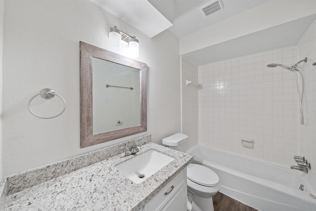 23206 Goodfellow Dr, Spring, TX 77373 - bathroom featuring vanity, tub / shower combination, and wood finished floors