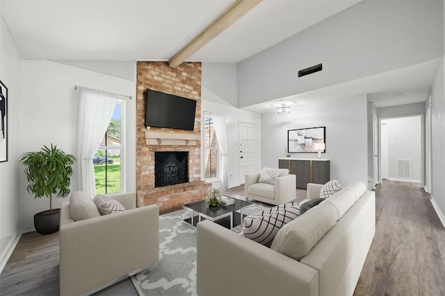 23206 Goodfellow Dr, Spring, TX 77373 - living area featuring wood finished floors and a fireplace