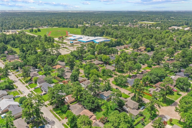 23206 Goodfellow Dr, Spring, TX 77373 - aerial overview of property's location featuring a heavily wooded area and nearby suburban area