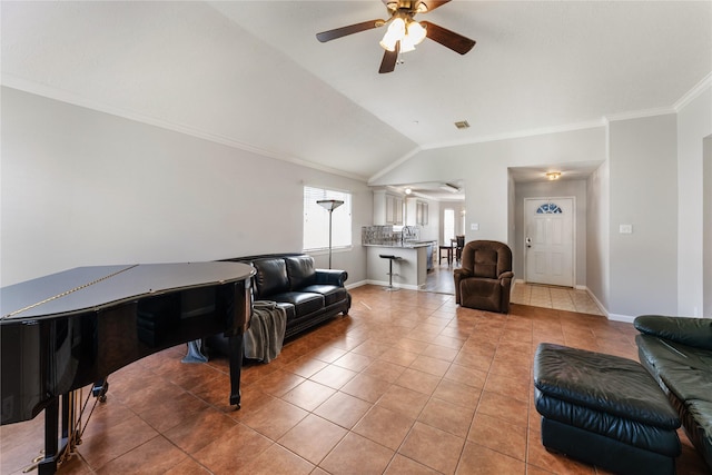 2410 Prides Crossing Rd, Houston, TX 77067 - living room with light tile patterned floors, ceiling fan, vaulted ceiling, and ornamental molding