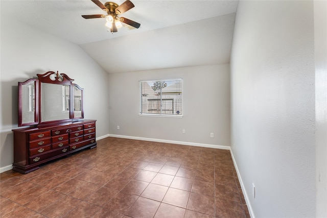 2410 Prides Crossing Rd, Houston, TX 77067 - bedroom with lofted ceiling, dark tile patterned flooring, and ceiling fan