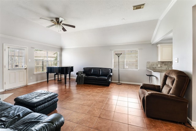 2410 Prides Crossing Rd, Houston, TX 77067 - living area featuring a ceiling fan, light tile patterned flooring, ornamental molding, and vaulted ceiling
