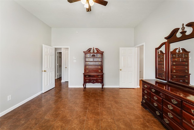2410 Prides Crossing Rd, Houston, TX 77067 - tiled bedroom featuring baseboards and ceiling fan