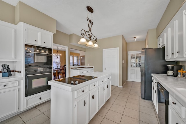 2706 Country Club Dr, Pearland, TX 77581 - kitchen featuring black appliances, tile countertops, and white cabinets