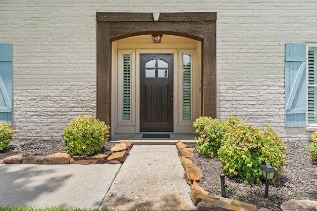 115 Heather Ln, Conroe, TX 77385 - property entrance featuring brick siding