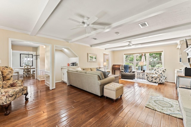115 Heather Ln, Conroe, TX 77385 - living area with a ceiling fan, hardwood / wood-style flooring, beam ceiling, a decorative wall, and crown molding