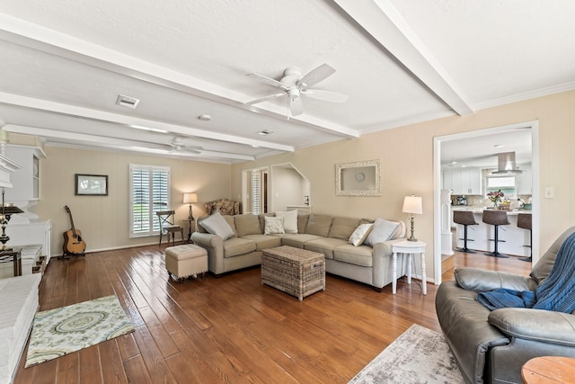 115 Heather Ln, Conroe, TX 77385 - living area featuring ceiling fan, hardwood / wood-style flooring, beam ceiling, and ornamental molding