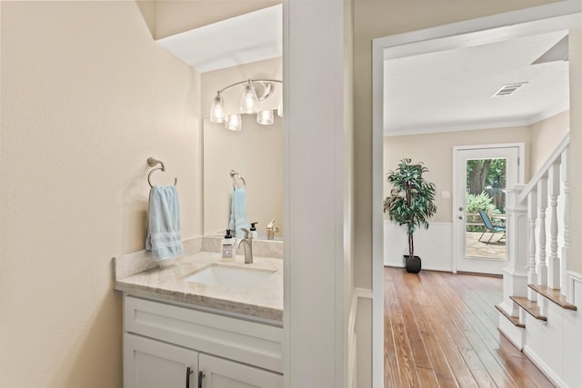 115 Heather Ln, Conroe, TX 77385 - bathroom featuring vanity and wood-type flooring