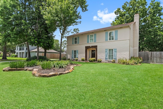 115 Heather Ln, Conroe, TX 77385 - view of front of house with a chimney