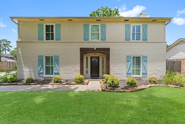 115 Heather Ln, Conroe, TX 77385 - view of front of house with a chimney