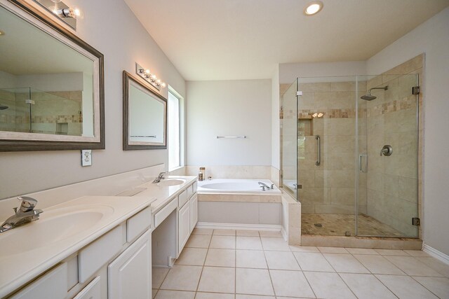806 Spring Mist Ct, Sugar Land, TX 77479 - bathroom with tile patterned floors, double vanity, a garden tub, a stall shower, and recessed lighting