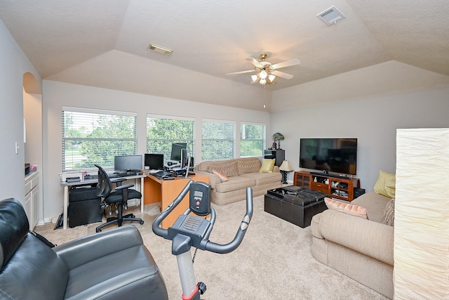 806 Spring Mist Ct, Sugar Land, TX 77479 - living area with vaulted ceiling, ceiling fan, carpet, a desk, and a textured ceiling