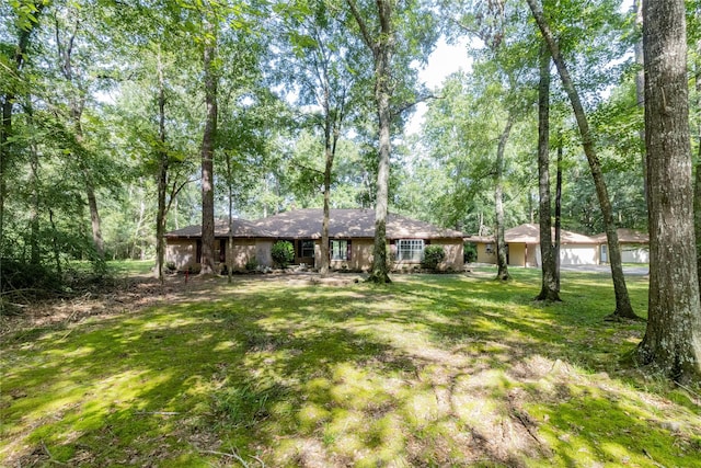 15823 Stagecoach Rd, Stagecoach, TX 77355 - view of front of house featuring a front yard