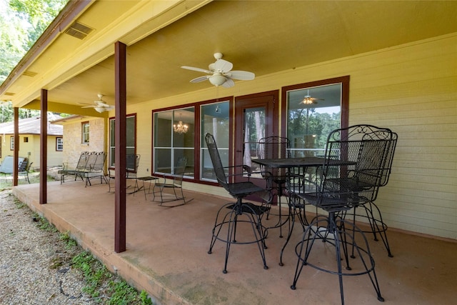 15823 Stagecoach Rd, Stagecoach, TX 77355 - view of patio / terrace featuring a ceiling fan and outdoor dining space