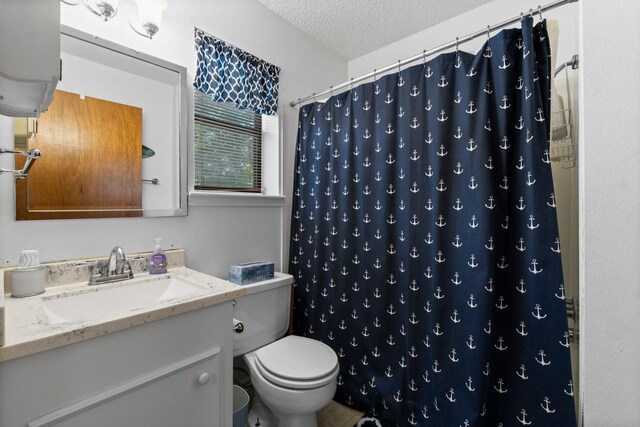 31 N Lakeview Dr, Point Blank, TX 77364 - full bathroom featuring vanity, a textured ceiling, and curtained shower