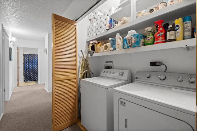 31 N Lakeview Dr, Point Blank, TX 77364 - laundry area featuring washer and clothes dryer, light colored carpet, and a textured ceiling