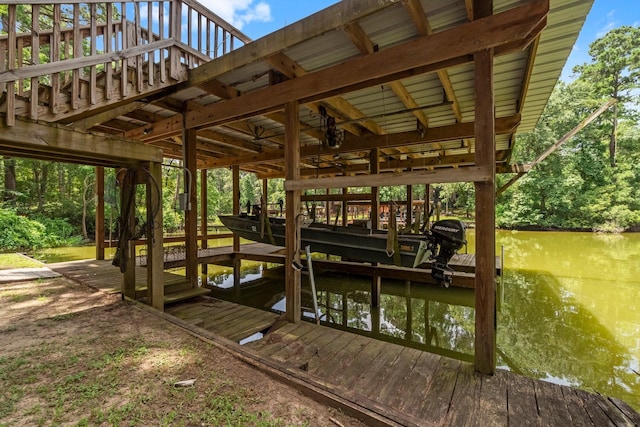 31 N Lakeview Dr, Point Blank, TX 77364 - dock featuring boat lift and a water view