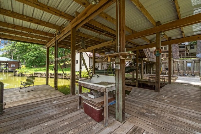 31 N Lakeview Dr, Point Blank, TX 77364 - wooden terrace featuring a dock and boat lift