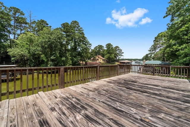31 N Lakeview Dr, Point Blank, TX 77364 - wooden terrace with view of scattered trees